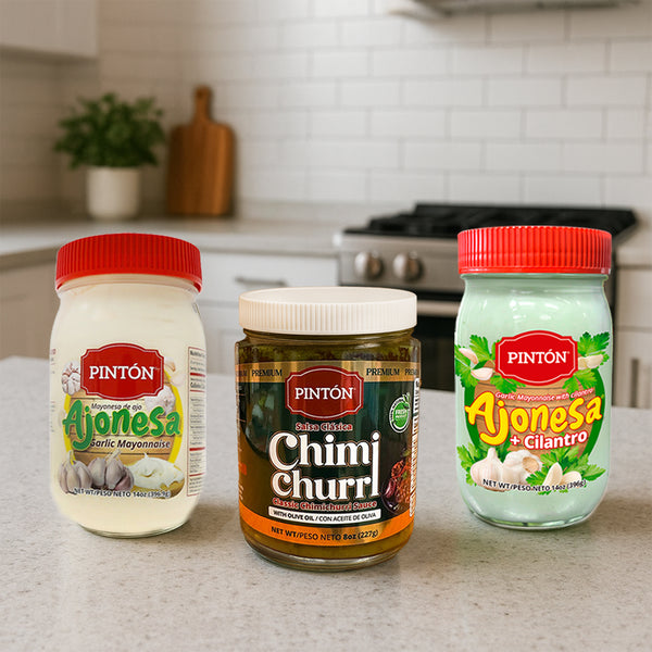 Pintón Gourmet Combo — Classic Ajonesa (garlic mayo), Ajonesa con Cilantro (garlic mayo with cilantro), and Caribbean‑Style Chimichurri (aromatic flavor)
