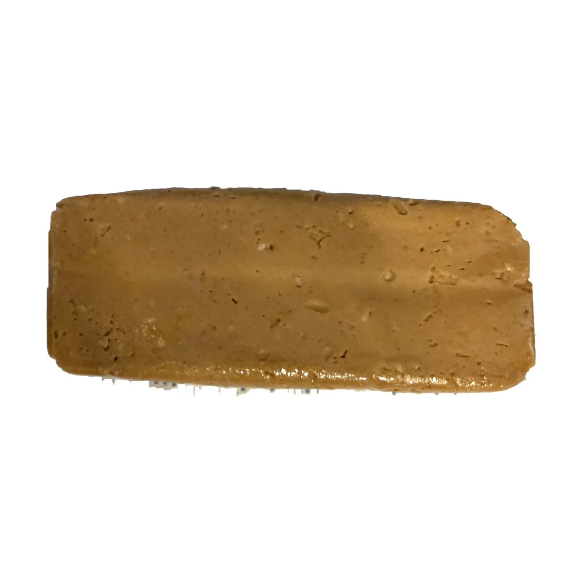 Barra de turrón de ajonjolí Pintón desenvuelta sobre fondo blanco